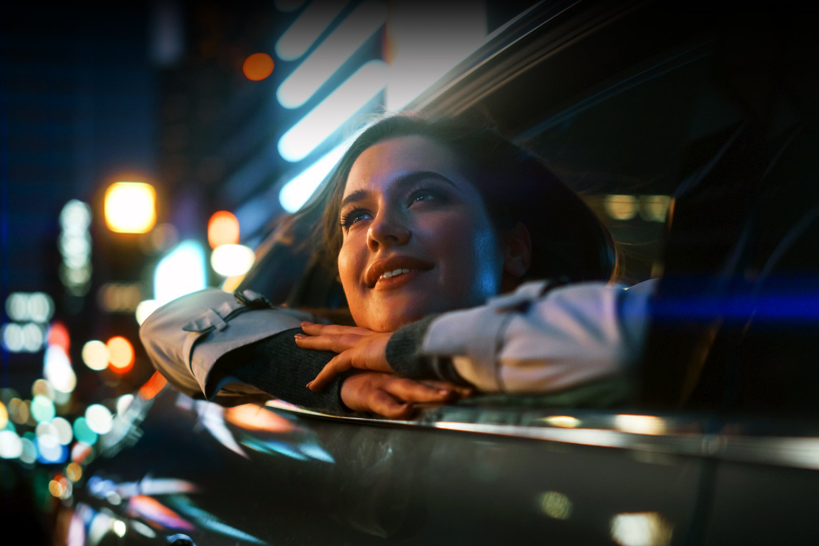 digital out-of-home - Vistar Media - woman looking our car window and digital screens